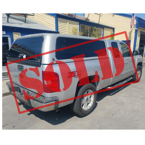 sold-gmc-used-truck-topper-leer-100XQ.png