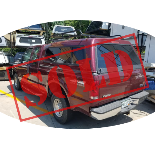 sold-used-camper-shell-ford-superduty.png