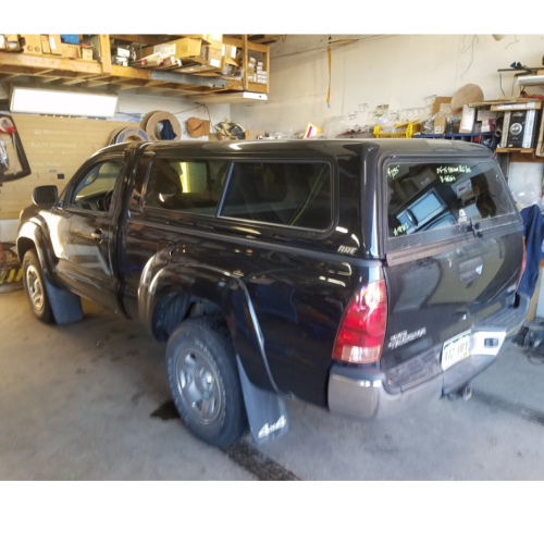 05-15-tacoma-used-black-truck-topper-greeley.png